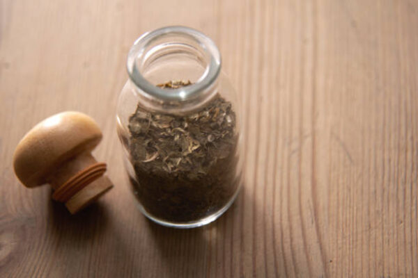 Top view of bottle of dried parsley